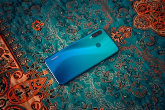 Elegant Tiffany blue background with subtle gold sparkles and a sleek phone icon symbolizing easy contact.