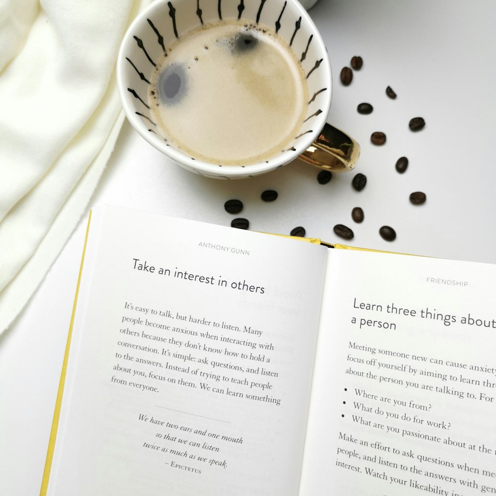 white ceramic cup on white ceramic saucer