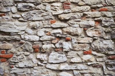 gray and white brick wall blarney stone teams background