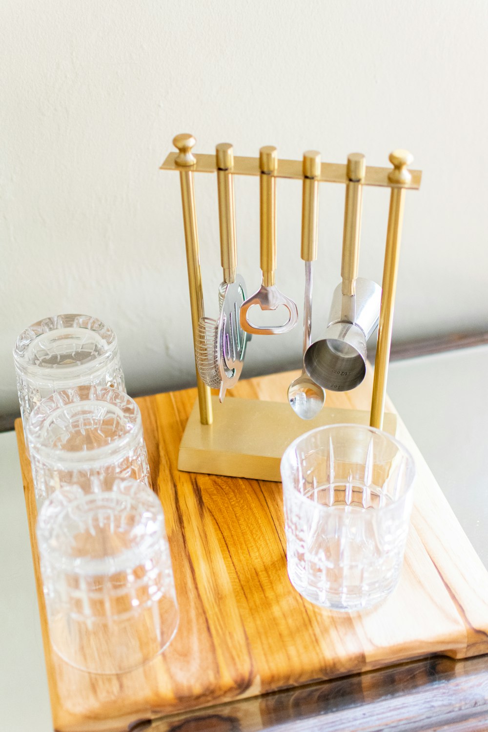 clear drinking glass on brown wooden table