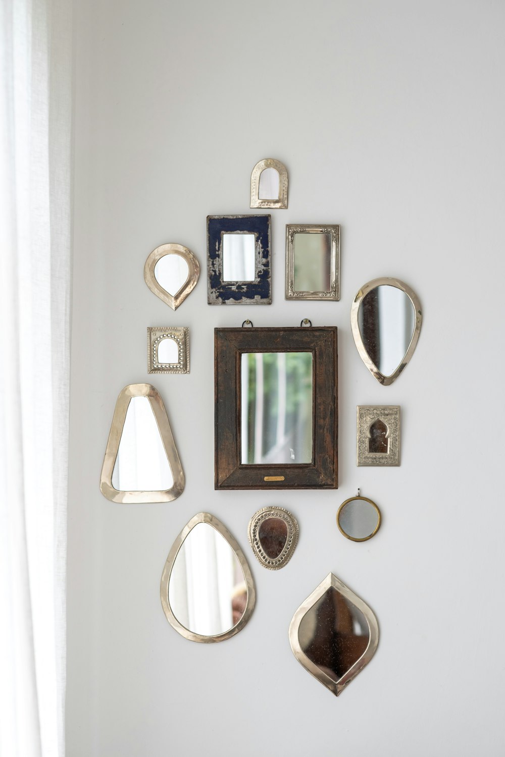 black framed wall mounted mirror