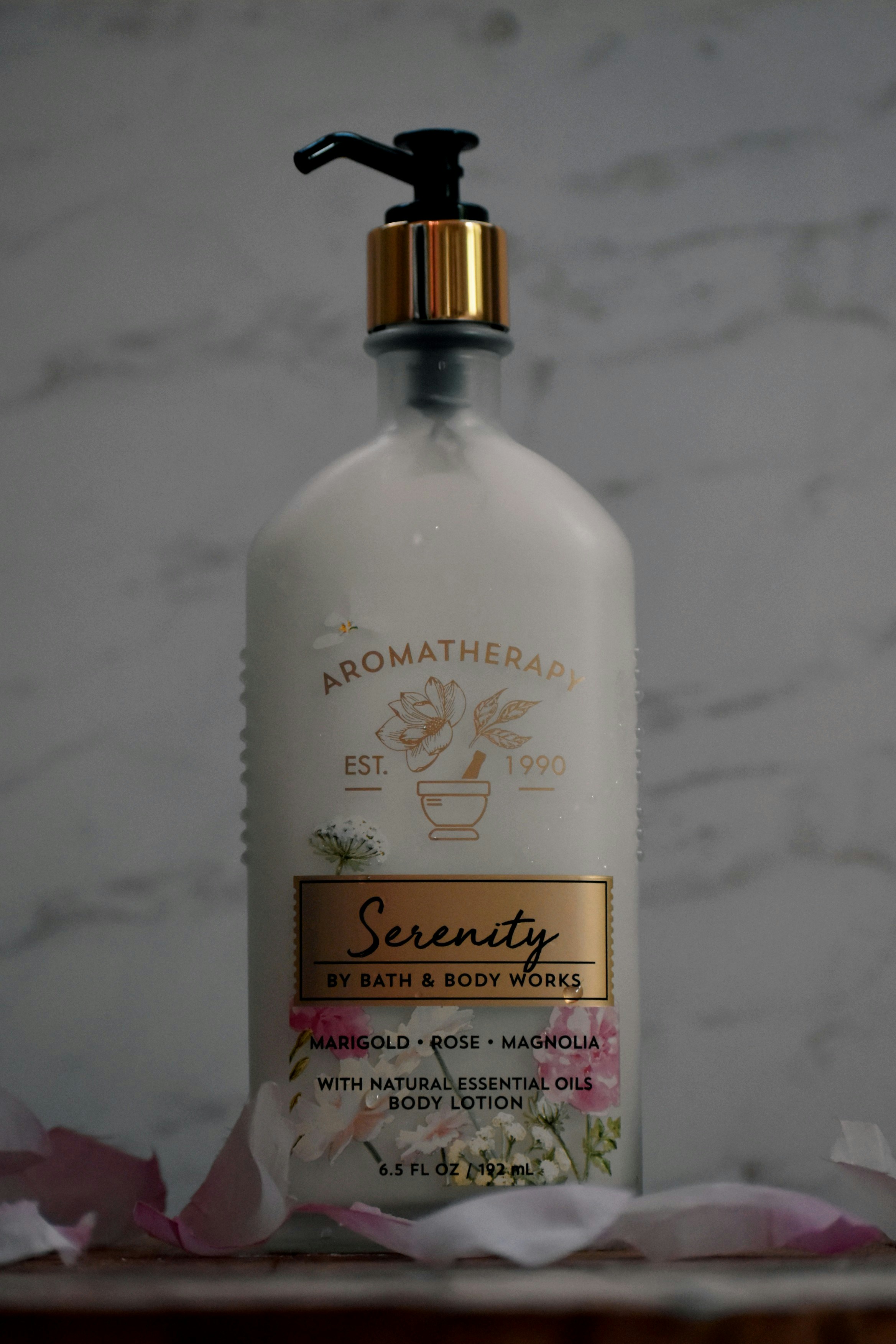 a bottle of soap sitting on top of a table