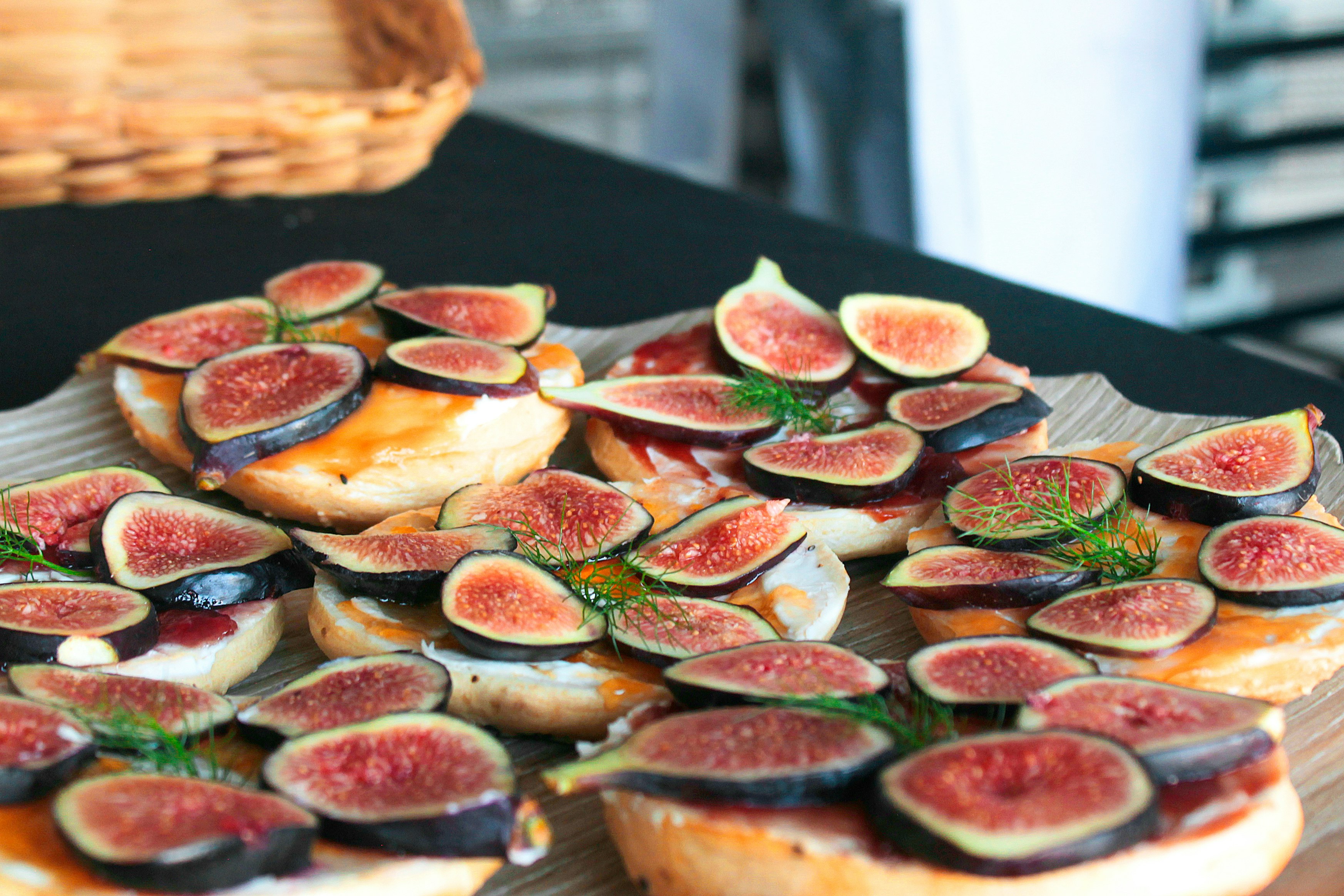 sliced pizza on brown wooden tray