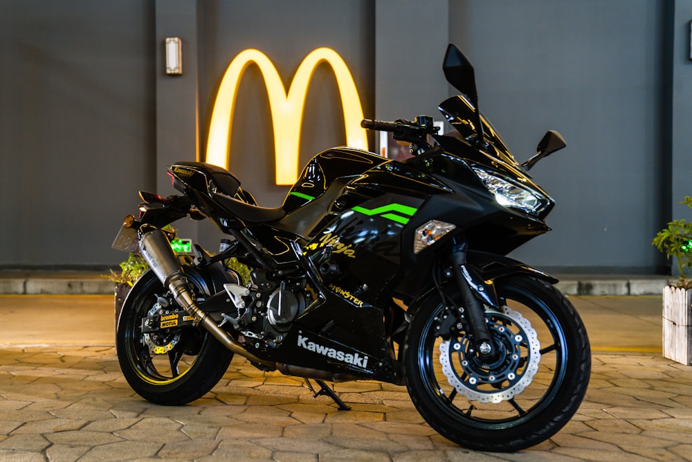 black and green sports bike