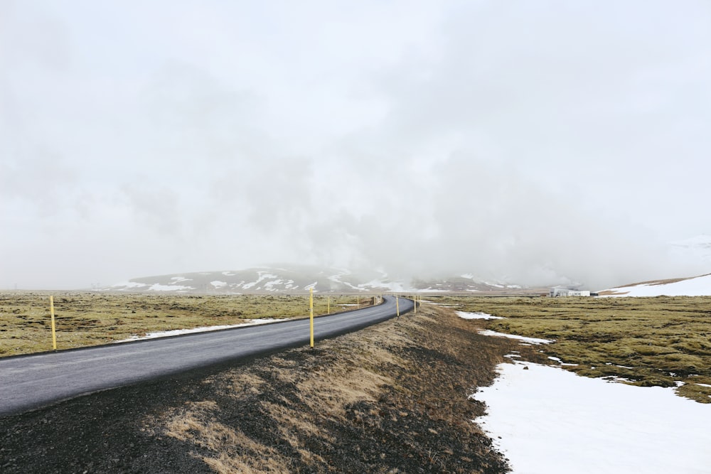 gray asphalt road under gray sky