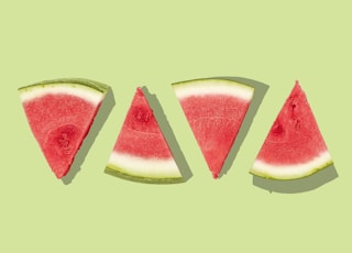 sliced watermelon with green background