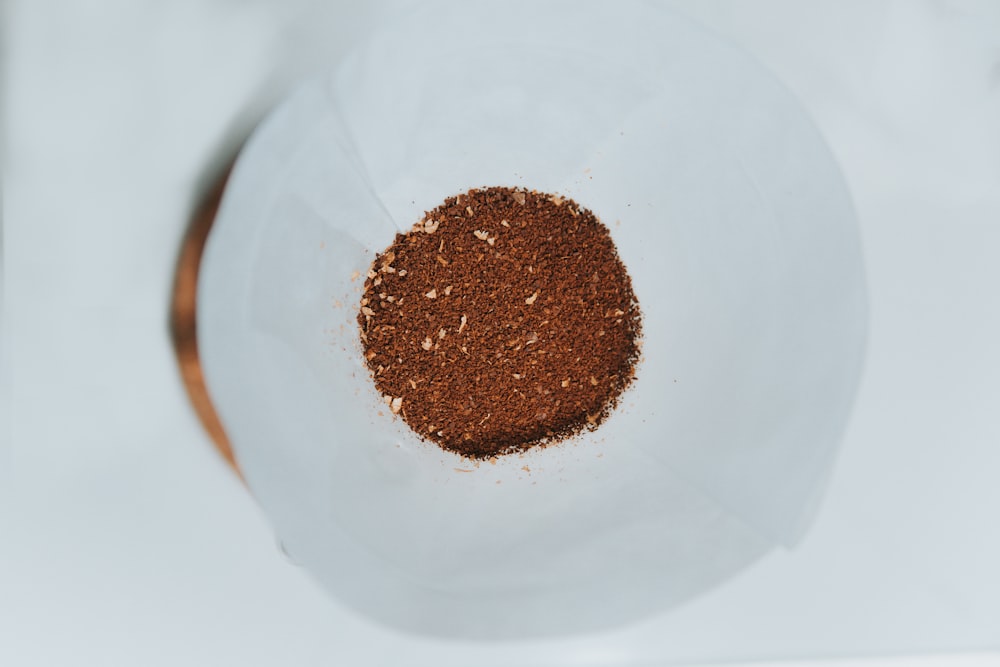 brown powder on white ceramic bowl