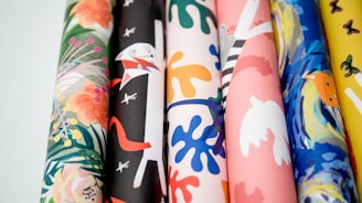 black white blue and pink floral textile