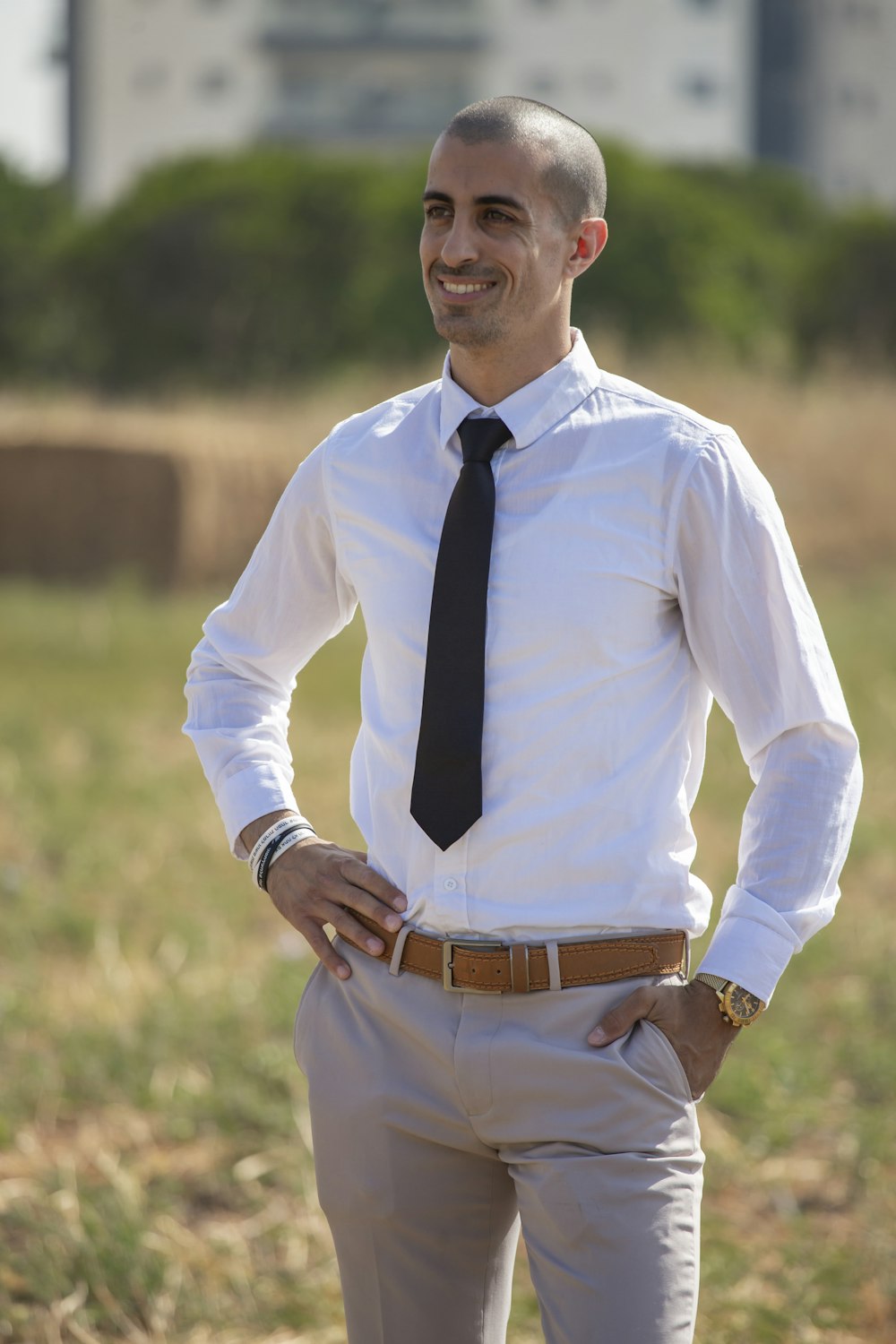man in white dress shirt and black necktie