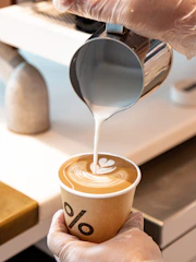 white ceramic mug with coffee