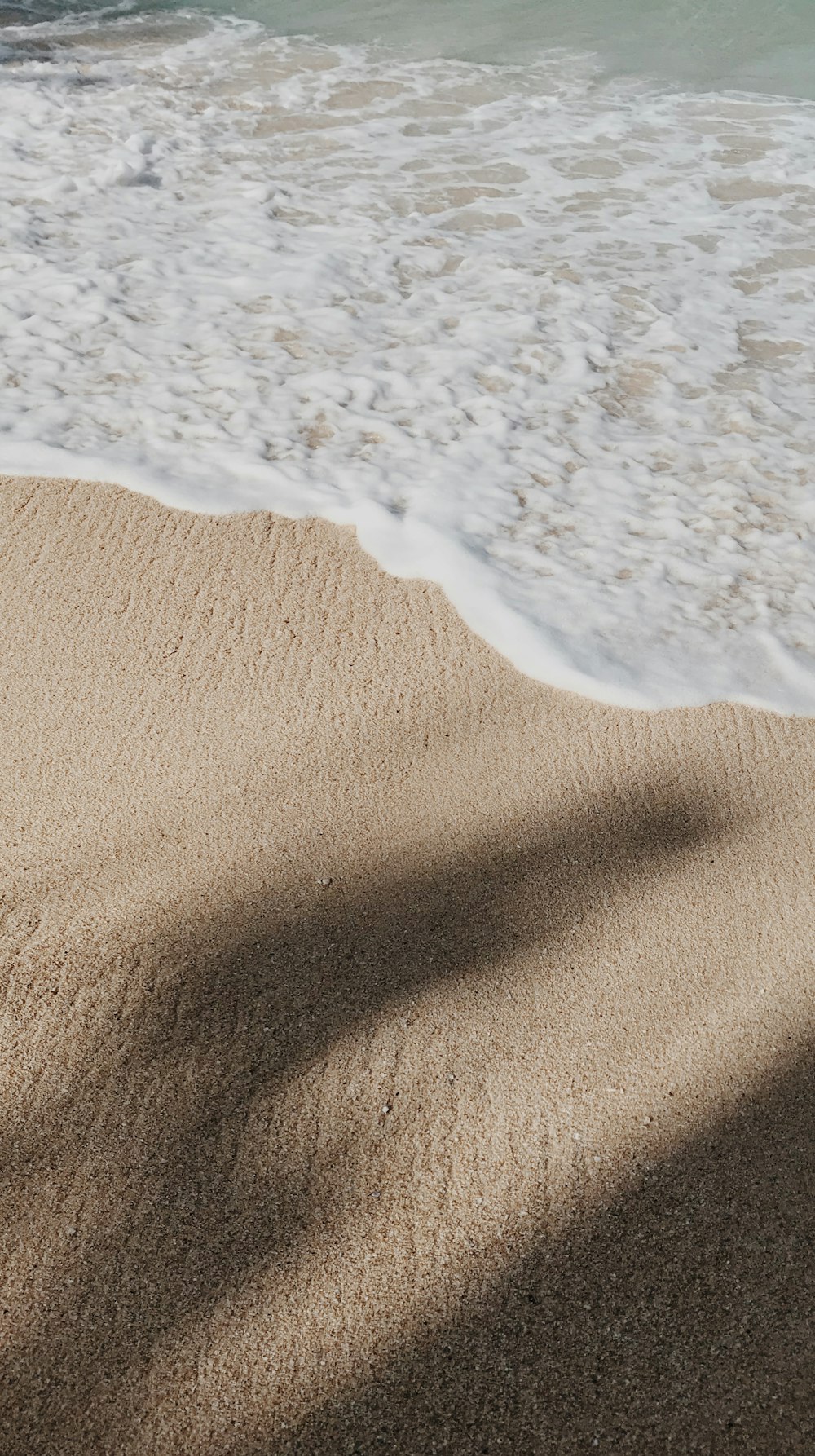 white and brown sand beach