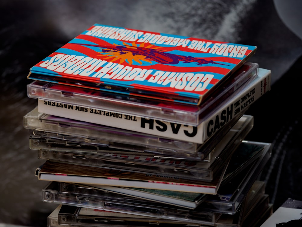 stack of books on black table