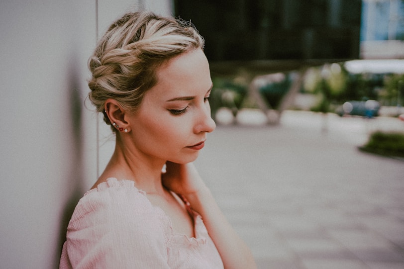 woman in white sleeveless dress