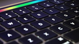 black and orange laptop computer
