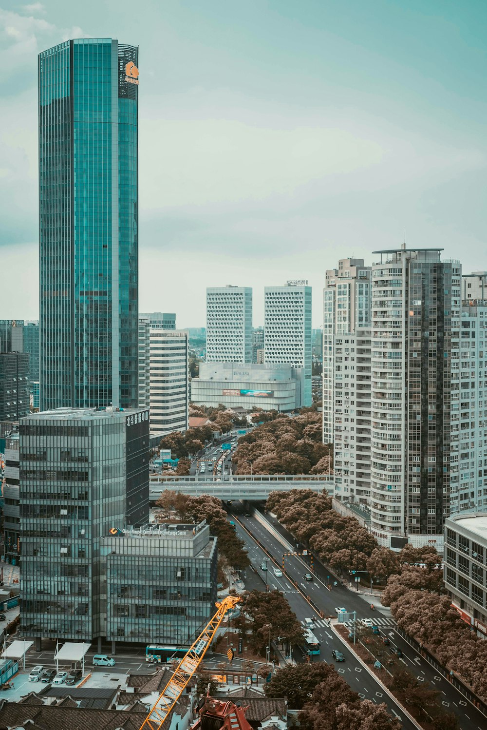 city buildings under white sky during daytime