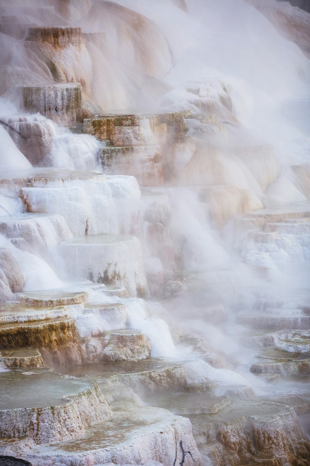 white ice on brown rock