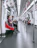 Passengers enjoying comfortable seating inside a modern train carriage.