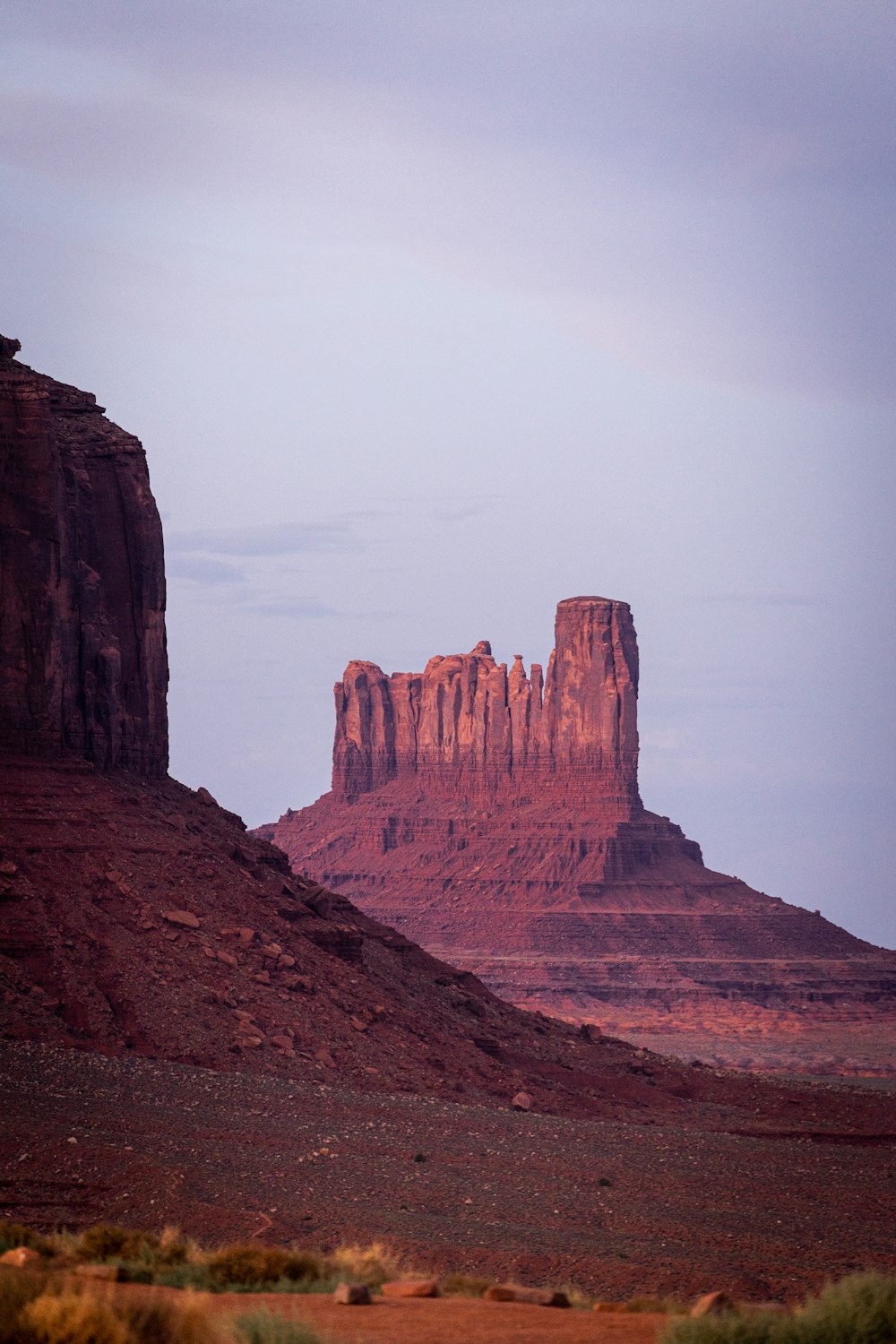 brown rock formation under white sky during daytime