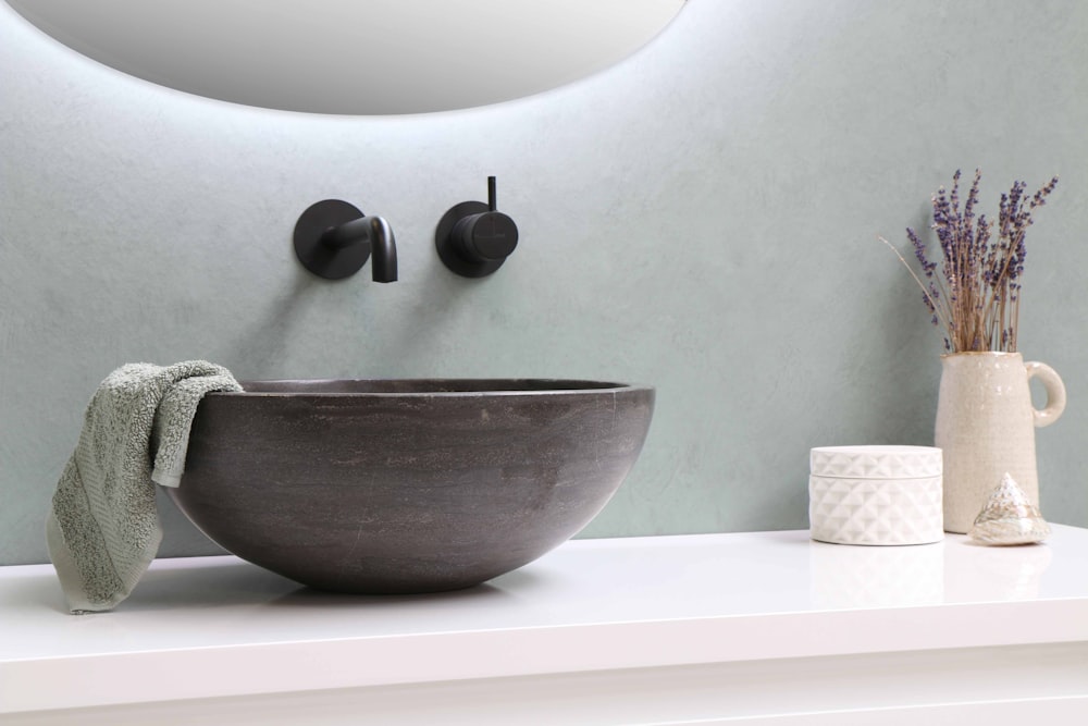 white ceramic bowl on white wooden table