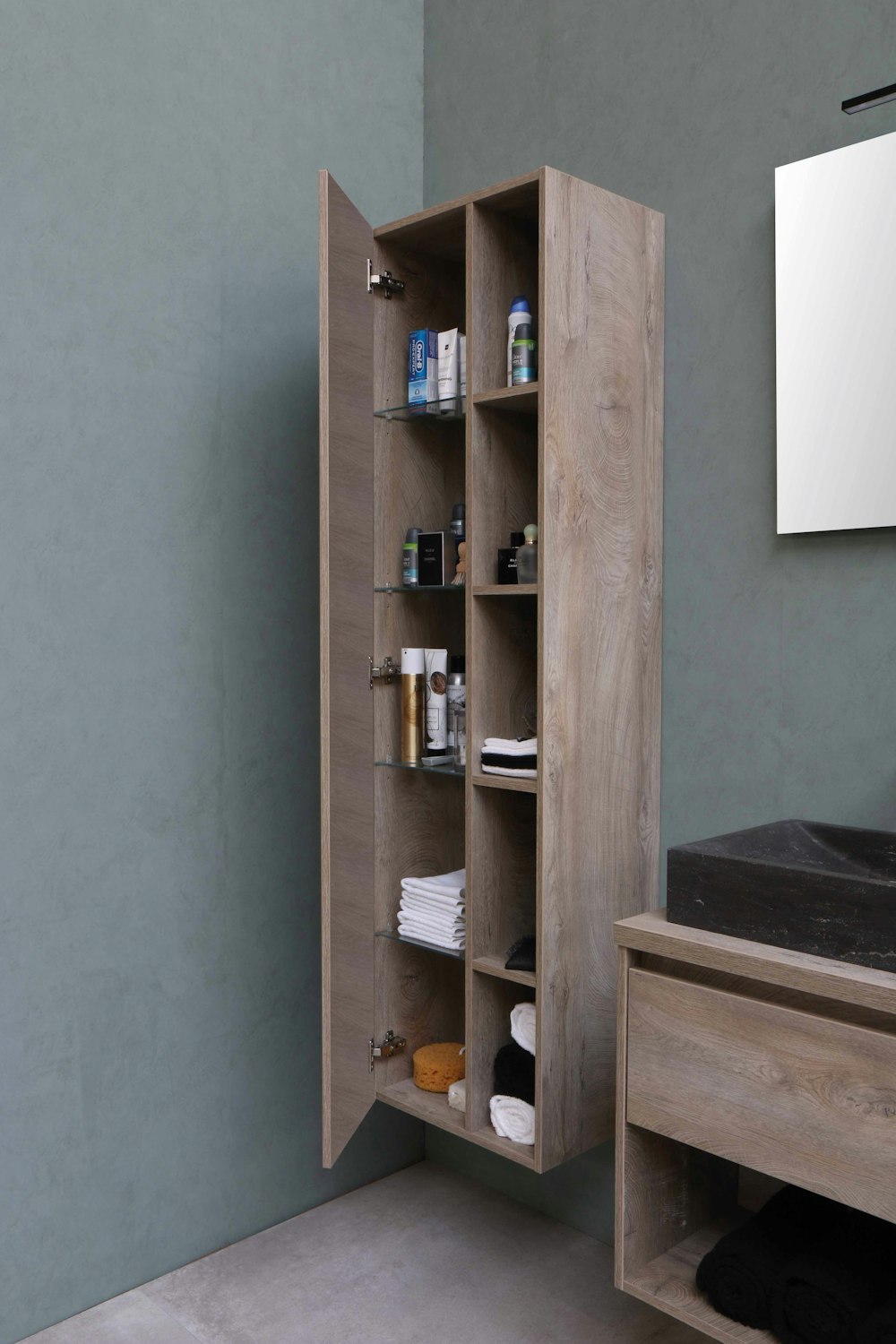 brown wooden shelf with books