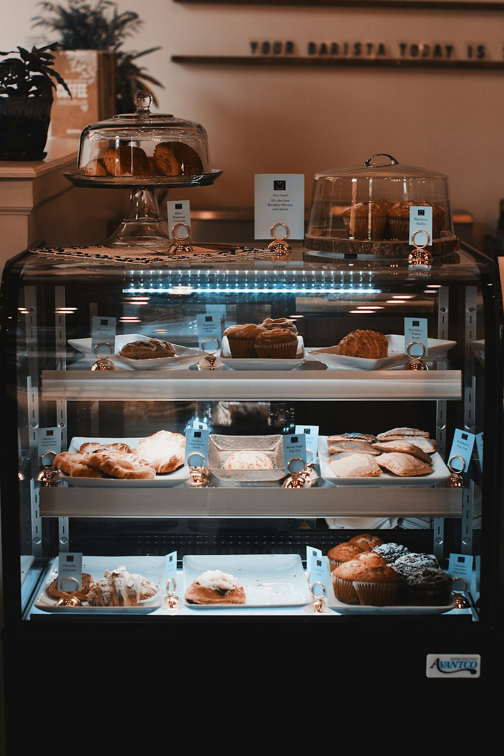 raw meat in clear glass display counter