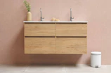 A beautifully designed free-standing bathroom vanity in a modern setting.