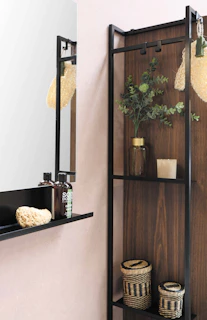 Bright, modern bathroom shelf neatly arranged with stylish storage baskets and fresh towels.