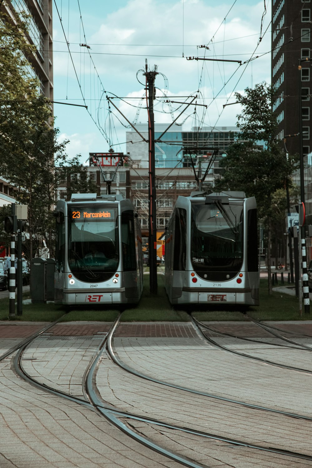 white and black tram on road during daytime