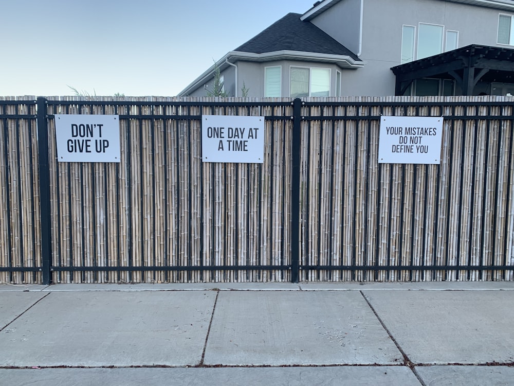 white and black wooden fence