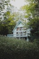 Bushkill Painting Company - white wooden house surrounded by green trees during daytime
