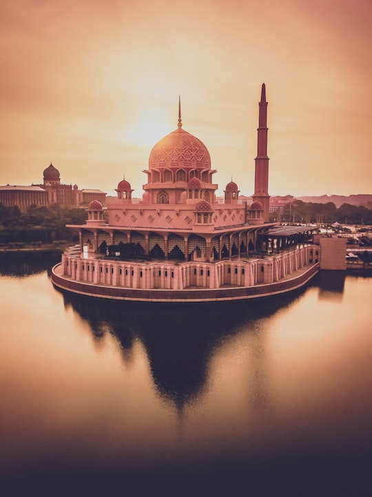 white and brown dome building in Masjid Putra Malaysia