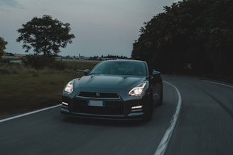 black bmw m 3 on road