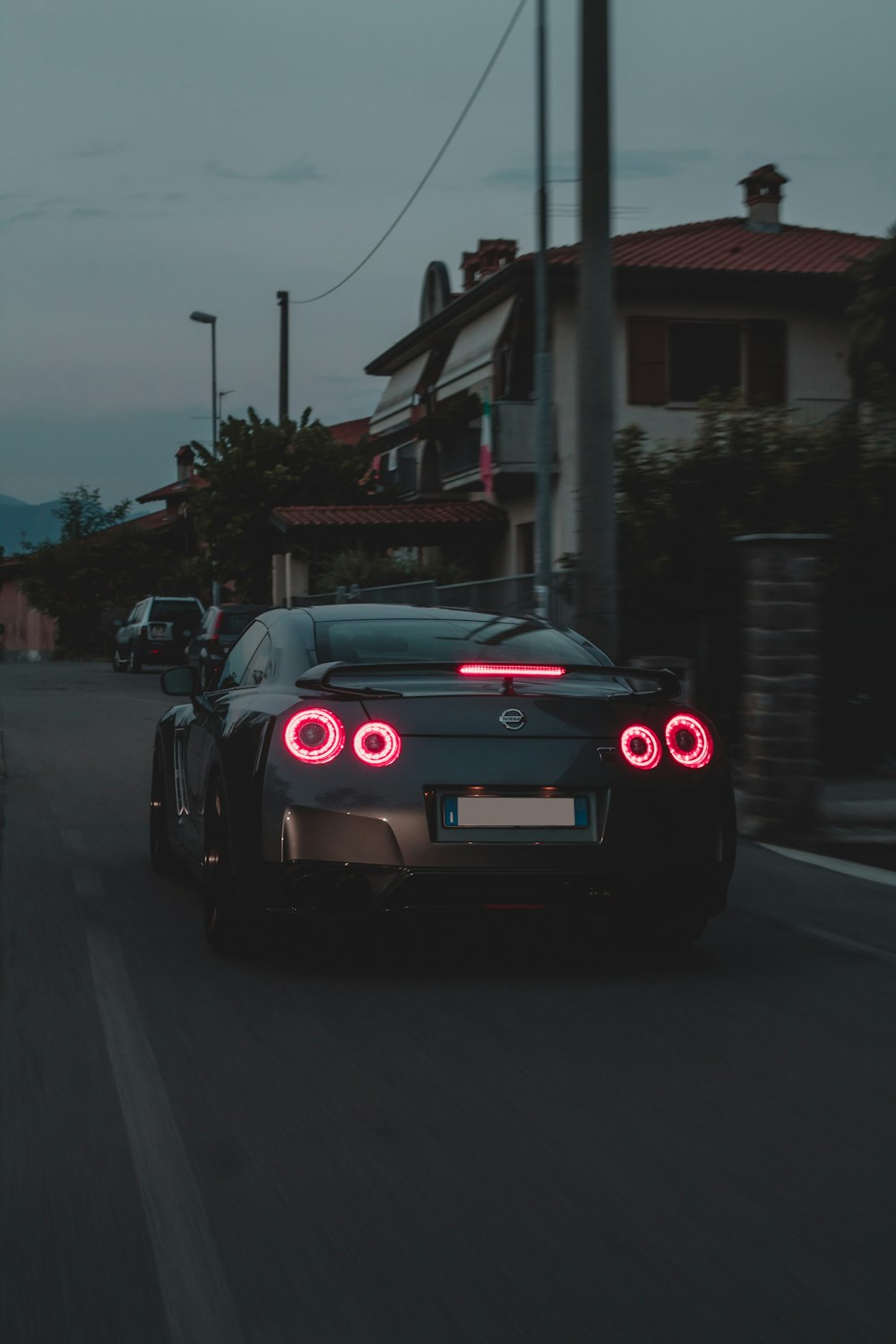 black porsche 911 on road during night time