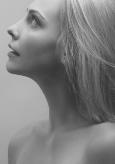 A portrait-style photograph showing a thoughtful moment, ideal for career history.