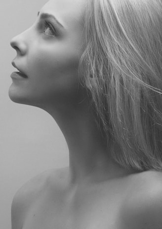 A portrait-style photograph showing a thoughtful moment, ideal for career history.