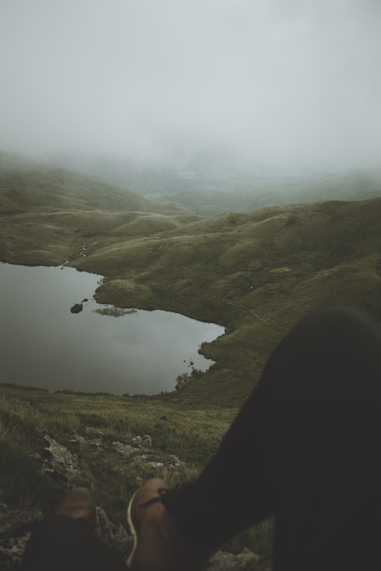 lake in the middle of mountains in Lake District National Park United Kingdom