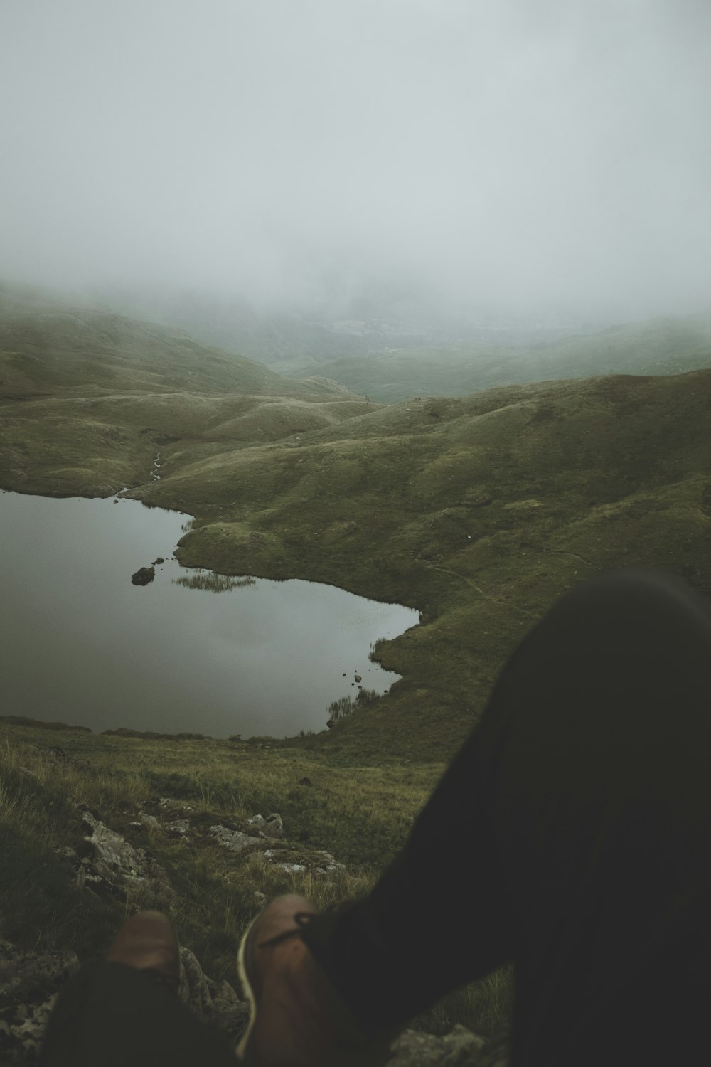 lake in the middle of mountains