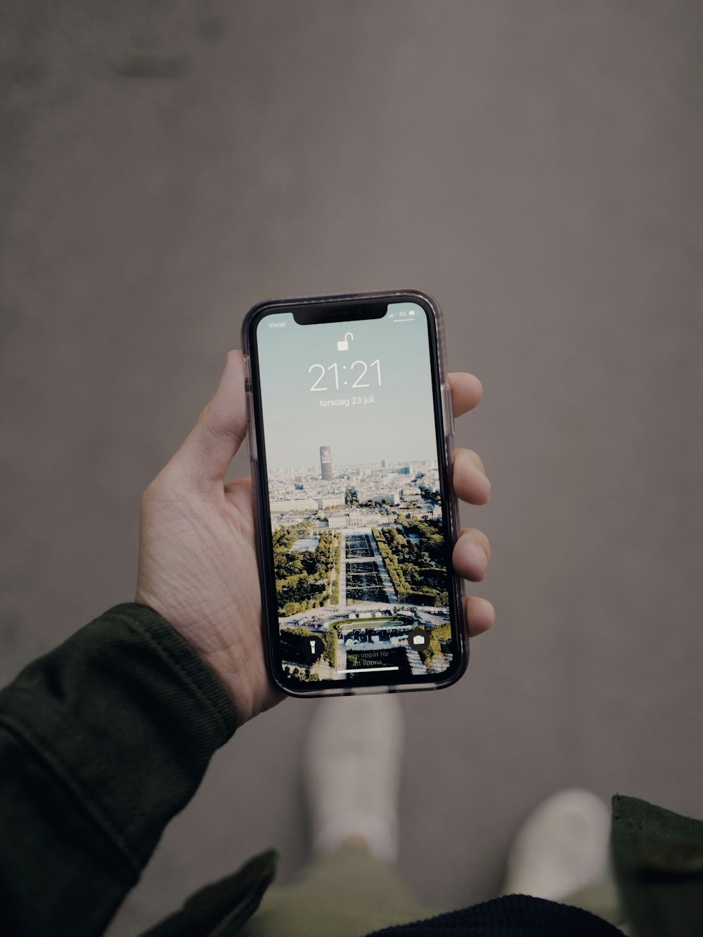 person holding black iphone 5