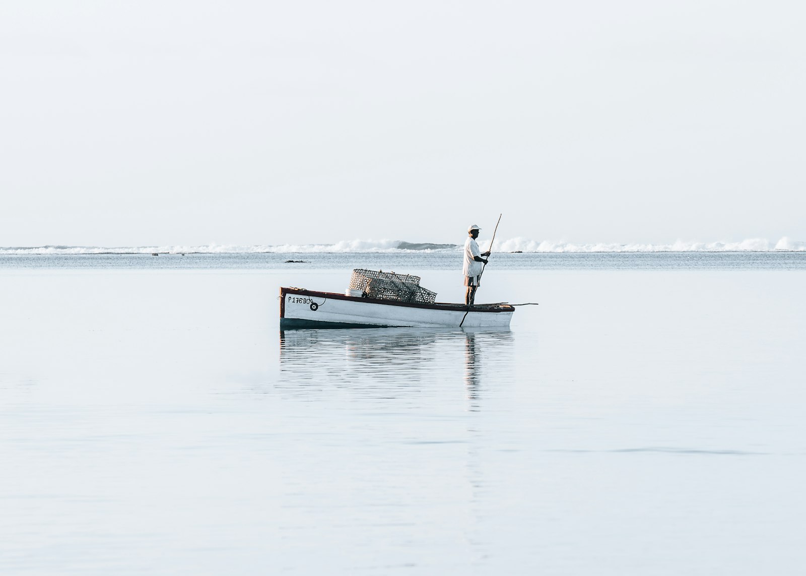 Sony a7R II + Sony FE 70-200mm F4 G OSS sample photo. Man in boat on photography