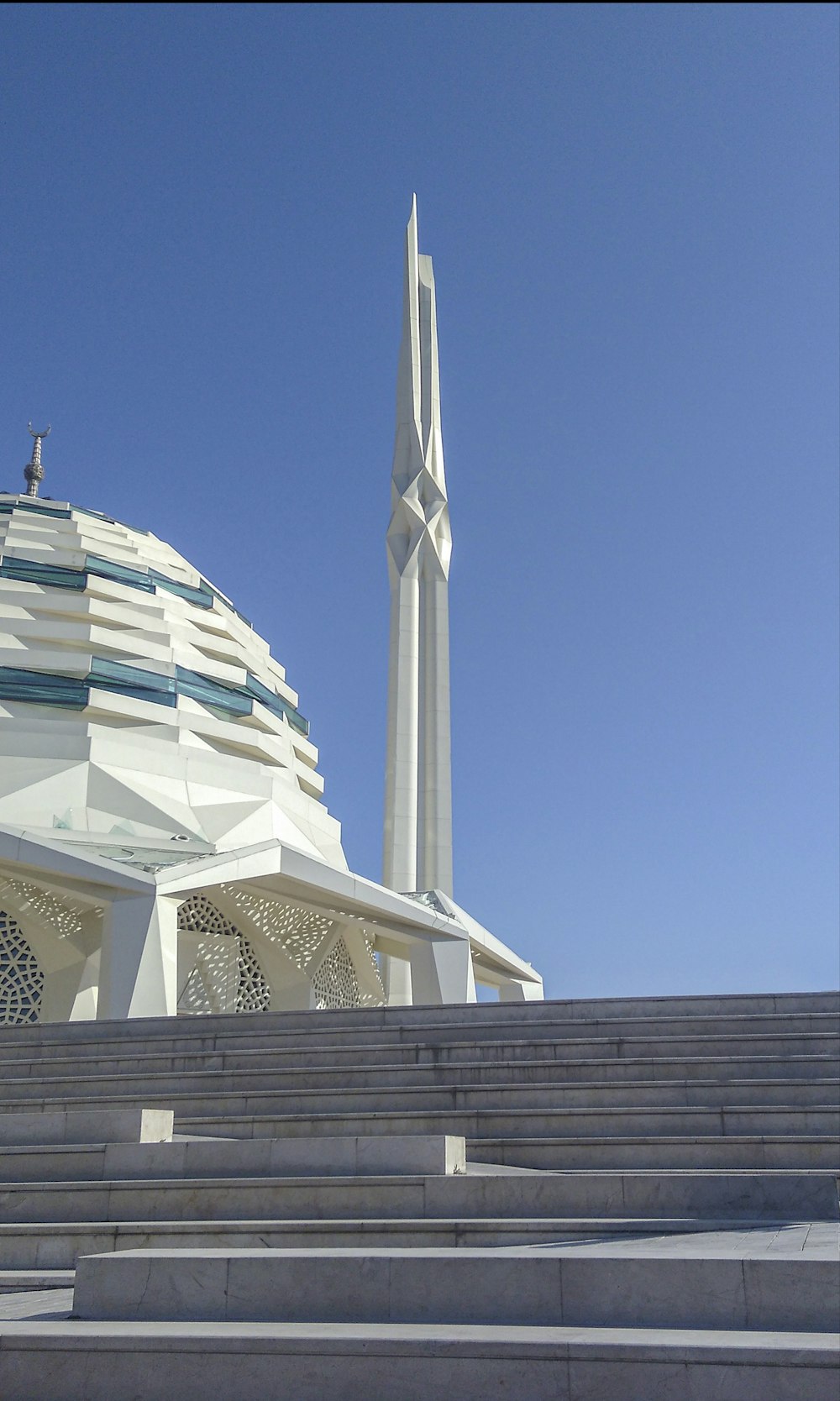 white and blue dome building under blue sky during daytime