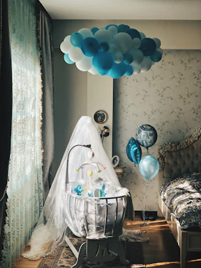 blue balloons on white mesh basket