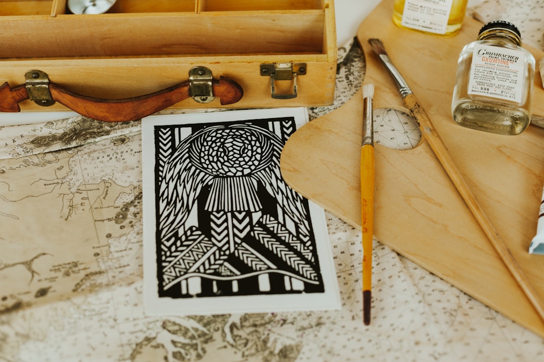 black and white sketch on white paper, A collection of art supplies.