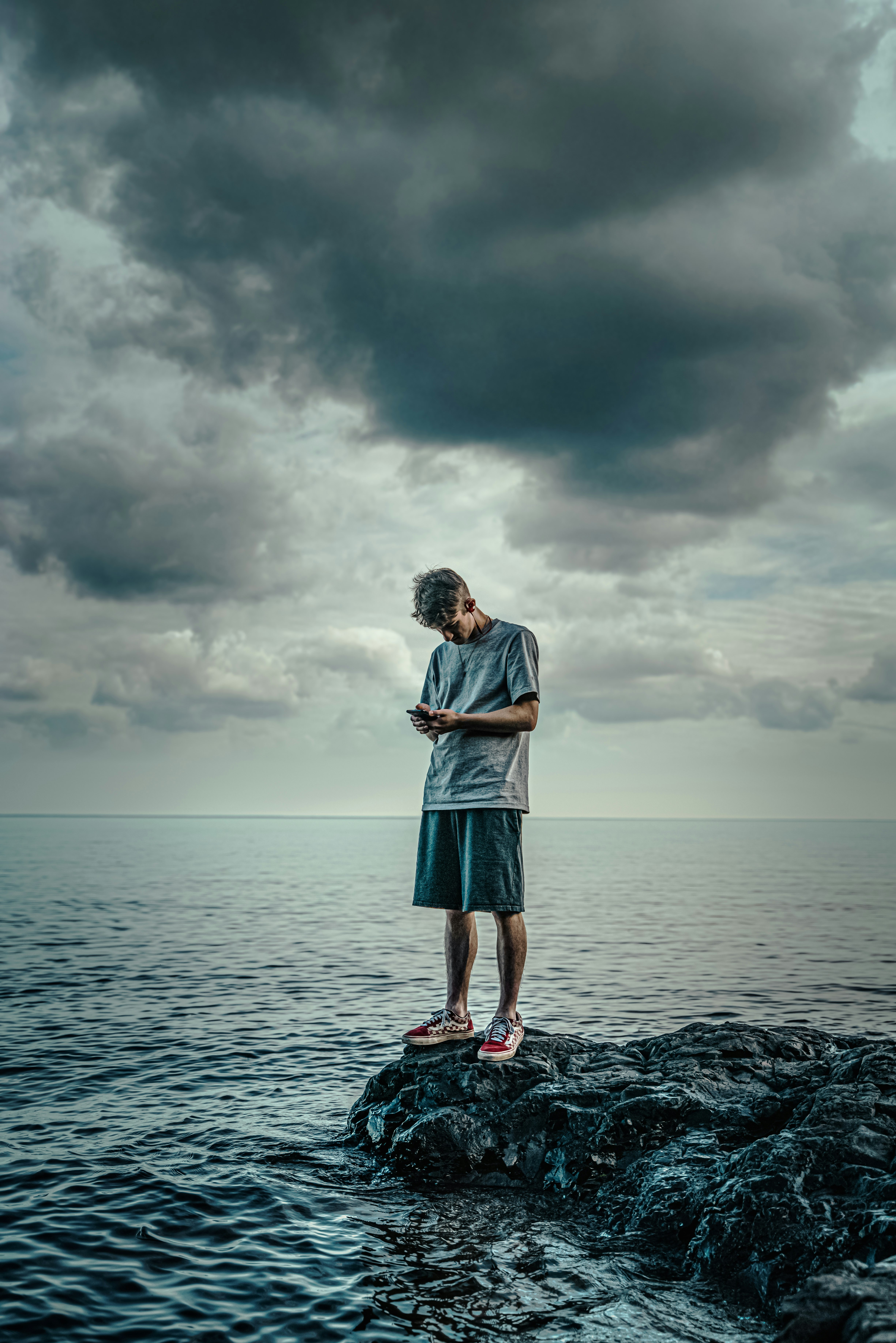 Tried to capture a portrait of my son on Lake Superior this weekend... but ended up capturing the story of an entire generation.

Surrounded by beauty and uncertainty...yet totally distracted.