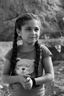 grayscale photo of girl in crew neck t-shirt