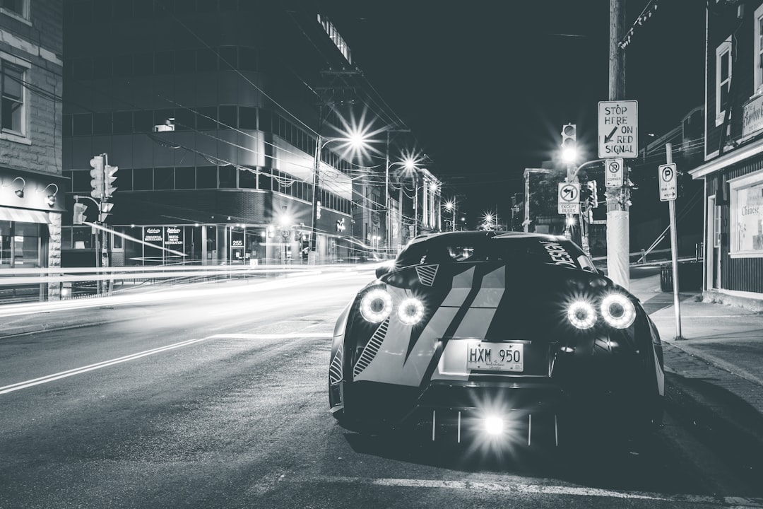 black porsche 911 on road during night time