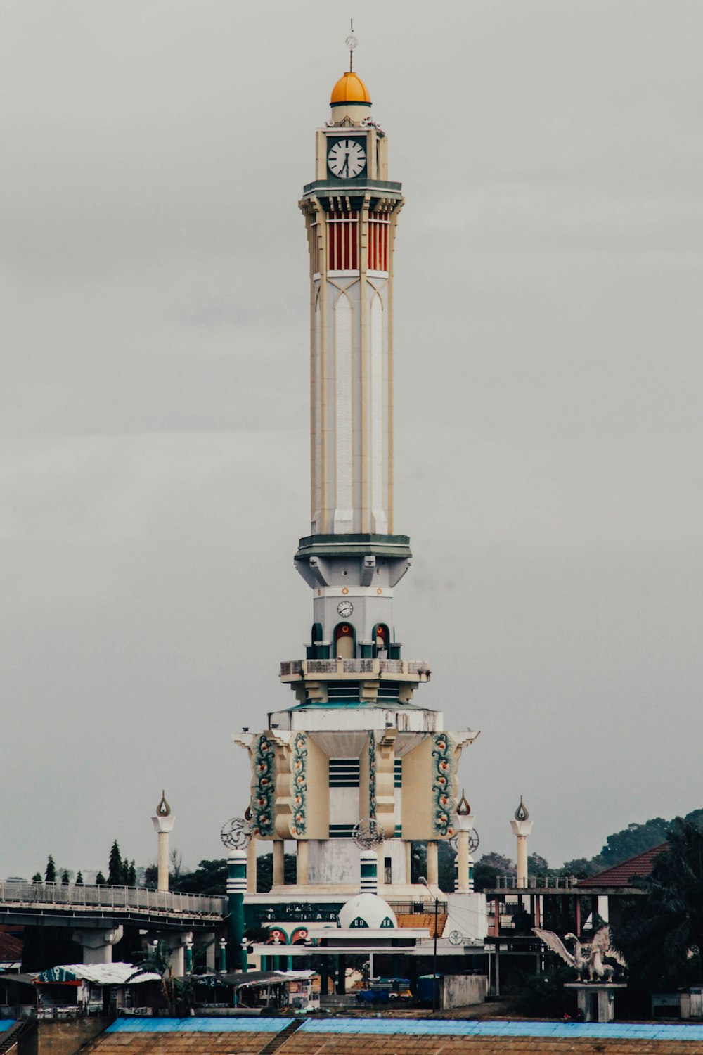 white concrete tower under white sky during daytime