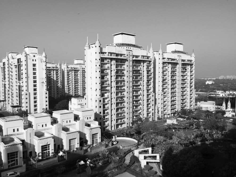 grayscale photo of city buildings