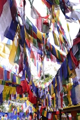 A vibrant display of handcrafted prayer flags fluttering in the breeze.