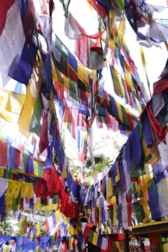 A vibrant display of handcrafted prayer flags fluttering in the breeze.