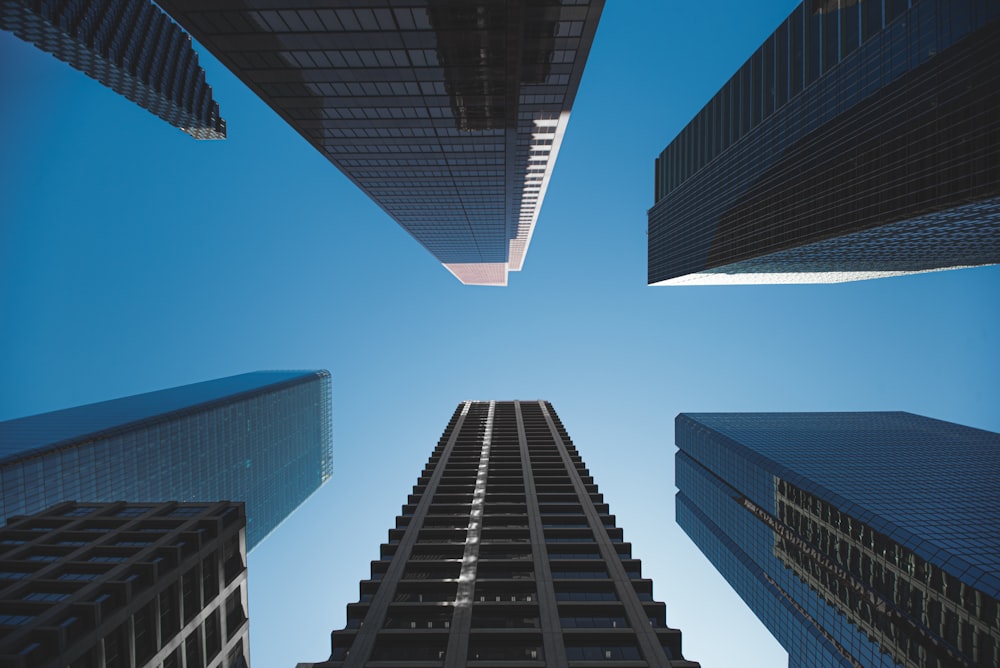 low angle photography of high rise buildings